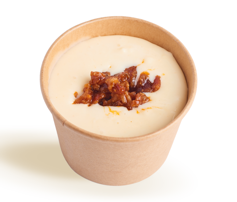 Rev Burger Bacon Wiz dipping sauce topped with bacon bits in a to-go cup